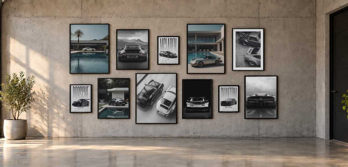 Gallery wall with Porsche and Ferrari posters